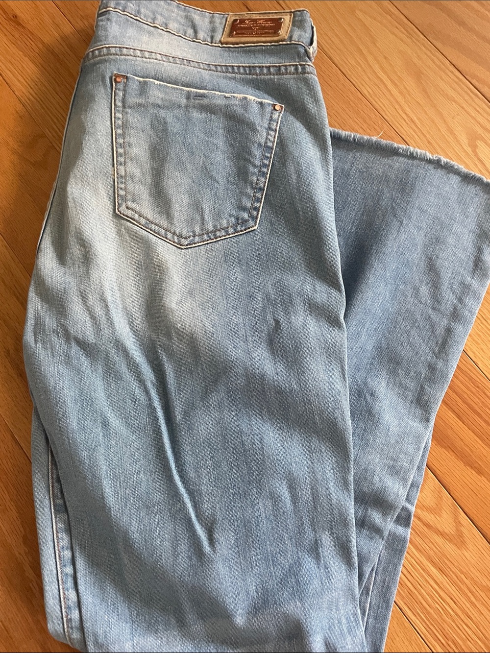 Light blue washed jeans. Brazilian designer